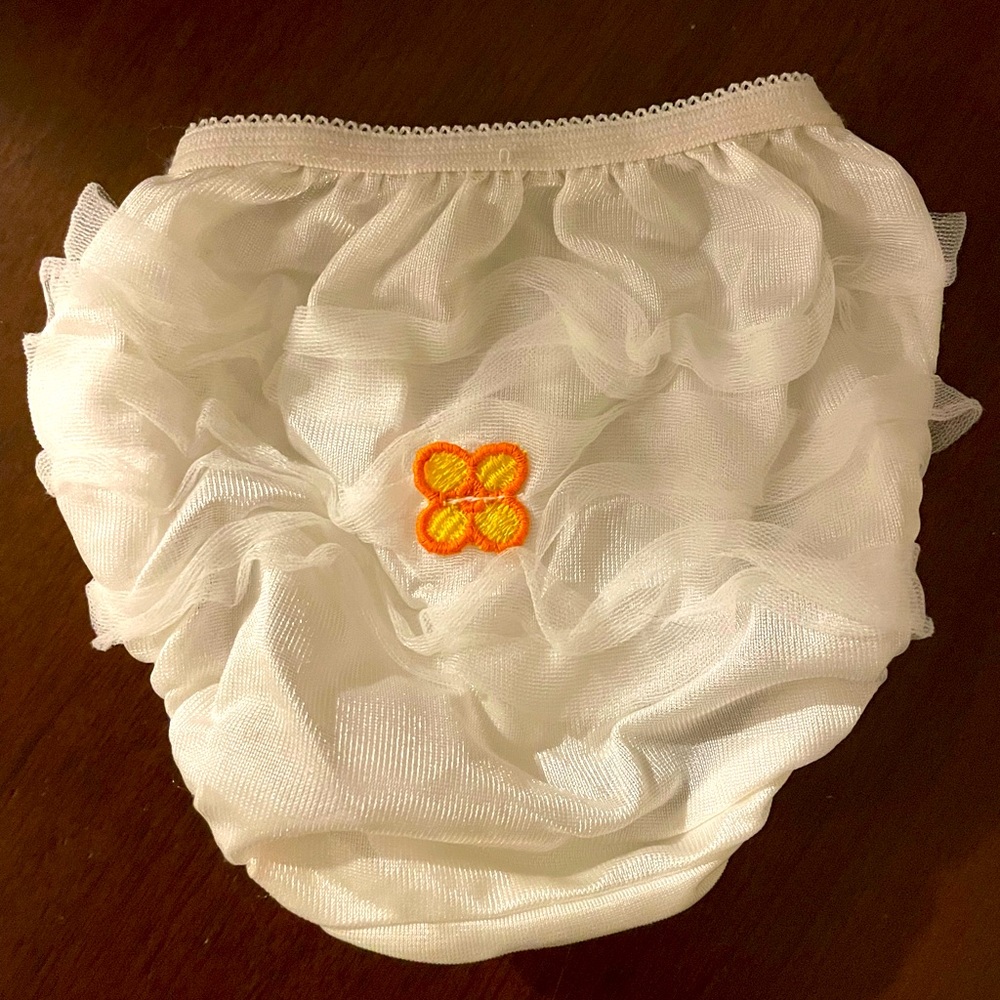 White bloomers with flower on the bum